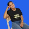 Female model wearing a black Ride At Da'wn graphic tee