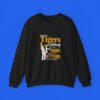 Black sweatshirt featuring a game-day rivalry design